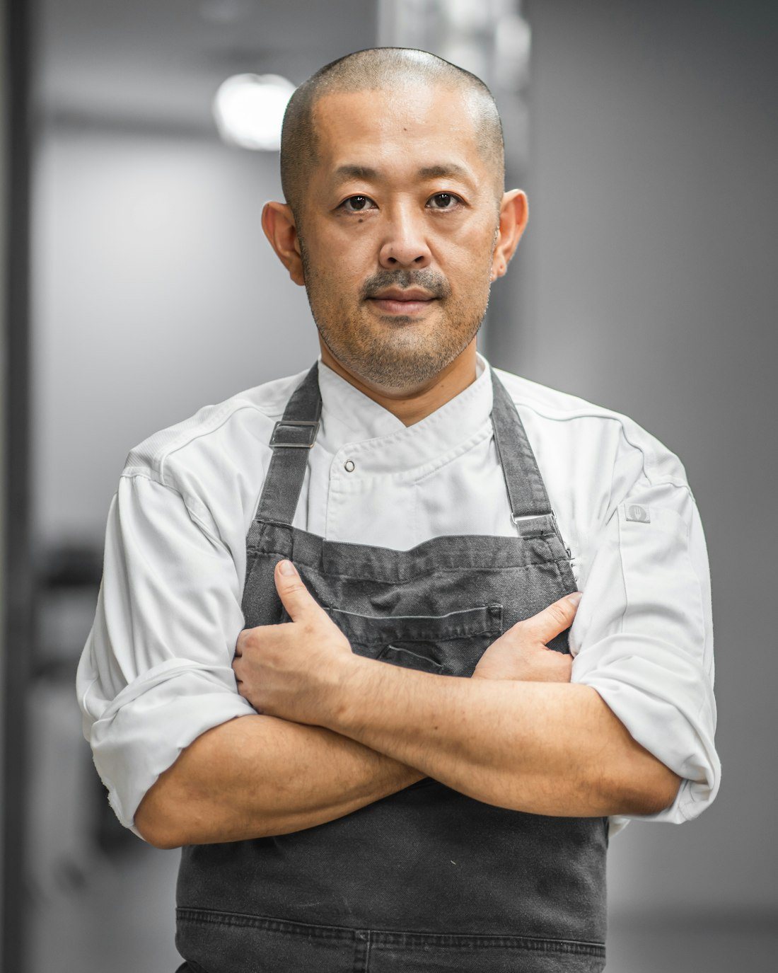 Portrait of the executive chef in whites and apron