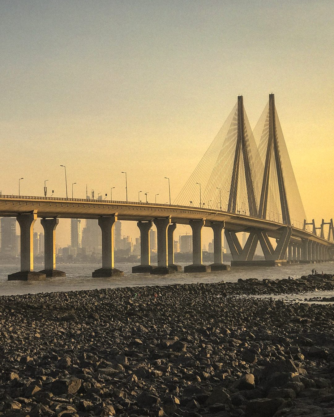 The Bandra–Worli Sea Link at golden hour, seen from the Bandra shore